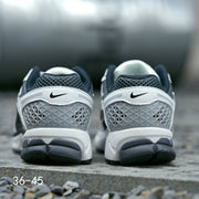 Nike Air Zoom Vomero 5 Sneakers, Black and White