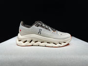 On Cloudtilt Sneakers in Gray and Apricot
