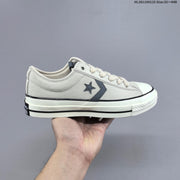 Converse Star Player Ox Low-Top Sneakers in Navy/White