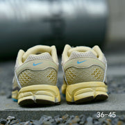 Nike Air Zoom Vomero 5 Sneakers in Pale Green and Blue