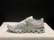 On Cloud X 4 AD Sneakers in Wolf/Alloy Light Gray