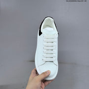 Alexander McQueen Oversized White Low-Top Sneakers with Black Heel