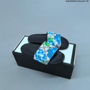 Gucci Floral Print Slide Sandals with Black Footbed