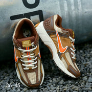Nike Air Zoom Vomero 5 Sneakers in Brown and Orange