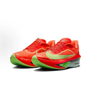 Nike Zoom Fly Running Shoes in Orange and Volt Green