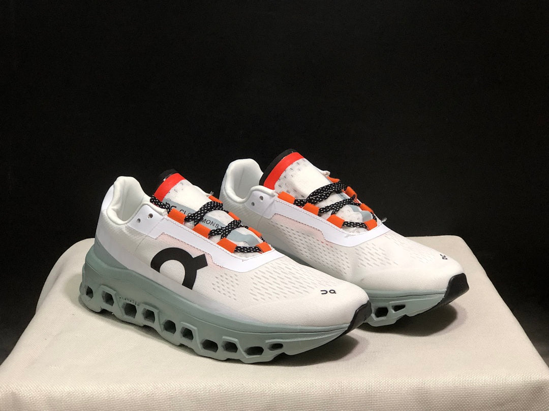 On Cloudmonster Sneakers in White and Blue