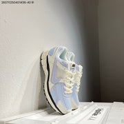 Nike Air Zoom Vomero 5 Sneakers in Cream, Blue and Lavender