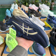 ASICS NOVABLAST 4 Running Shoes, Blue and Gold