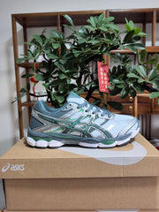 ASICS GEL-Cumulus 16 Sneakers in Green and White