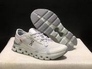 On Cloud X 4 AD Sneakers in Wolf/Alloy Light Gray