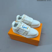 Louis Vuitton Trainer Low-Top Sneakers in Black and White