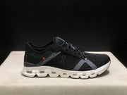 On Cloud X 4 AD Sneakers in Black and White