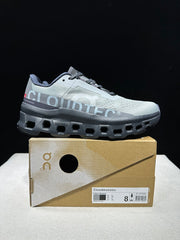 On Cloudmonster Running Shoes in Eclipse and Magnet
