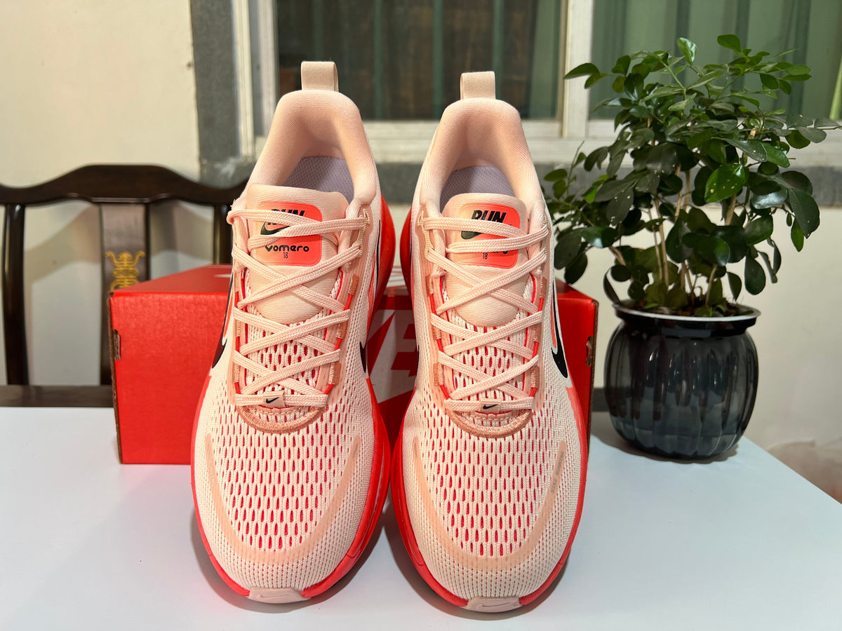 Nike Vomero 18 Running Shoes in Cream and Coral