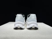On Cloudtilt Sneakers in Ivory and Black