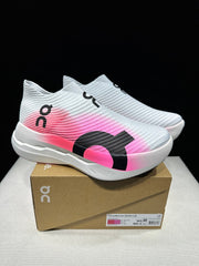 On Cloudboom Strike LS Running Shoes in Pink and White