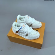 Louis Vuitton Studded Low-Top Sneakers in White and Black