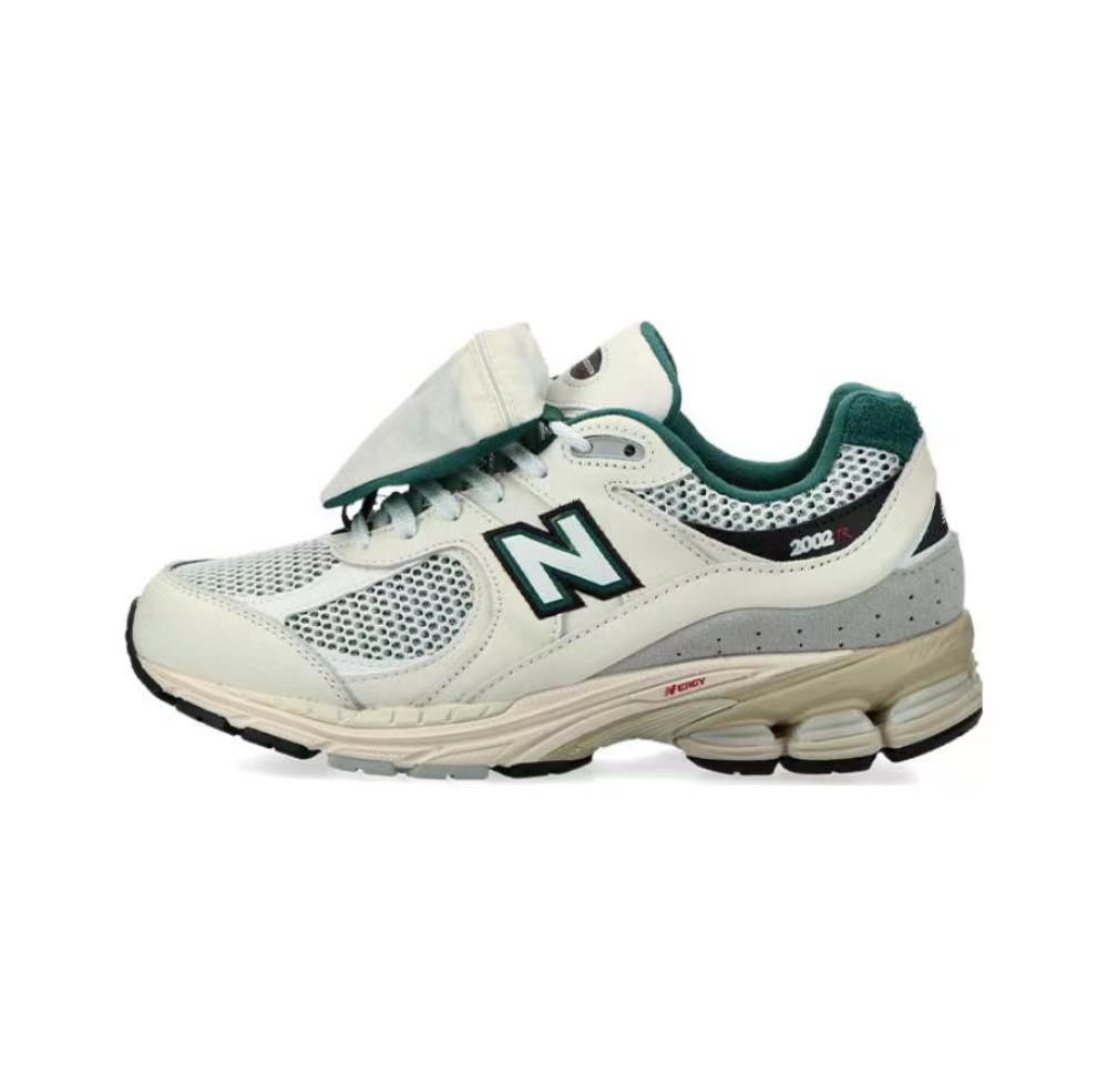 New Balance 2002RVD Sneakers in White and Green