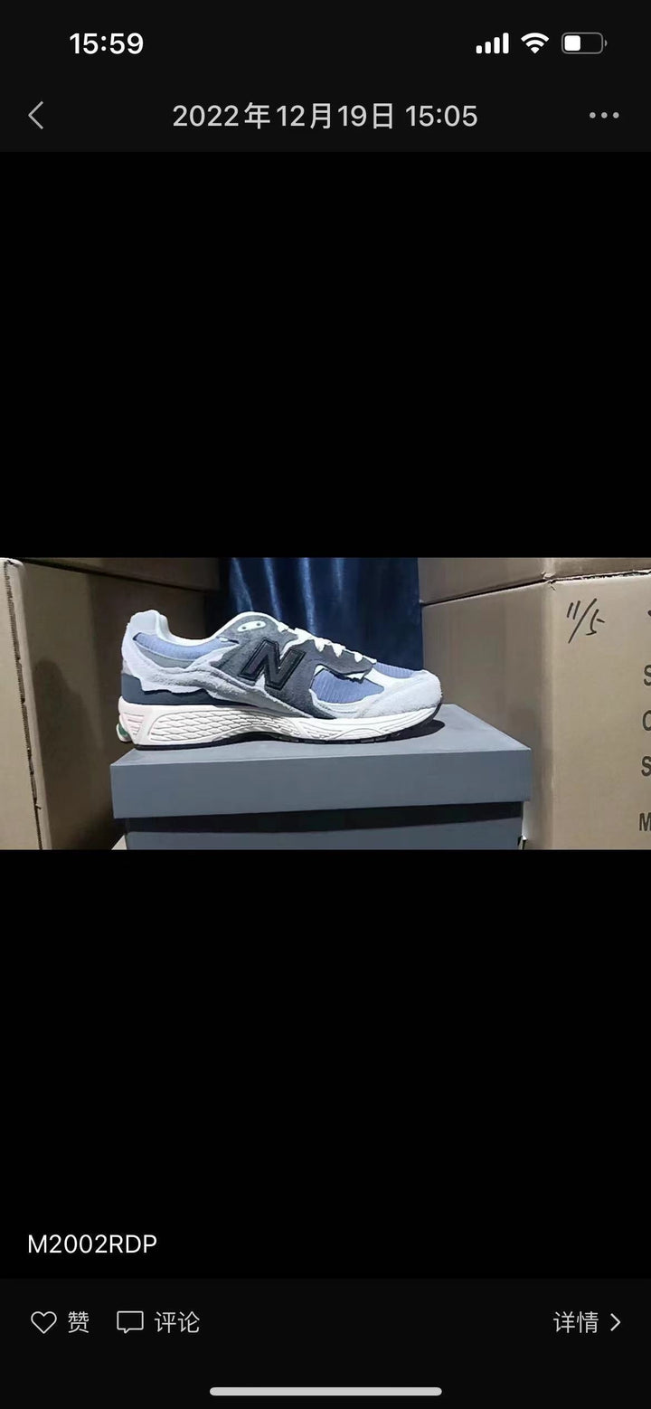 New Balance M2002RDP Sneakers in Blue and White