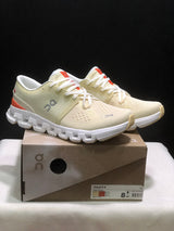 On Cloud X 4 Sneakers in Cream and Orange
