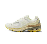 New Balance 2002R Sneakers in White and Yellow