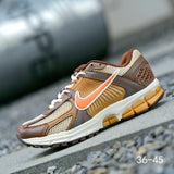Nike Air Zoom Vomero 5 Sneakers in Brown and Orange