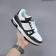 Louis Vuitton Trainer Sneakers in White and Black with Embellished Trim