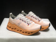 On Cloudsurfer Max Running Shoes in Pearl and Tangerine