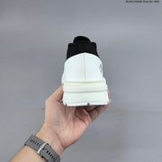 Descente Dualis Primer Slip-On Sneakers, White and Black