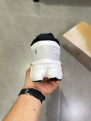 On Running White and Black Running Shoes