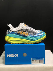 HOKA Stinson 7 Trail Sneakers in Blue and Lime