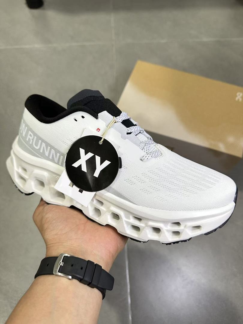On Running White and Black Running Shoes