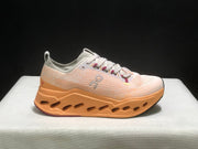 On Cloudsurfer Max Running Shoes in Pearl and Tangerine