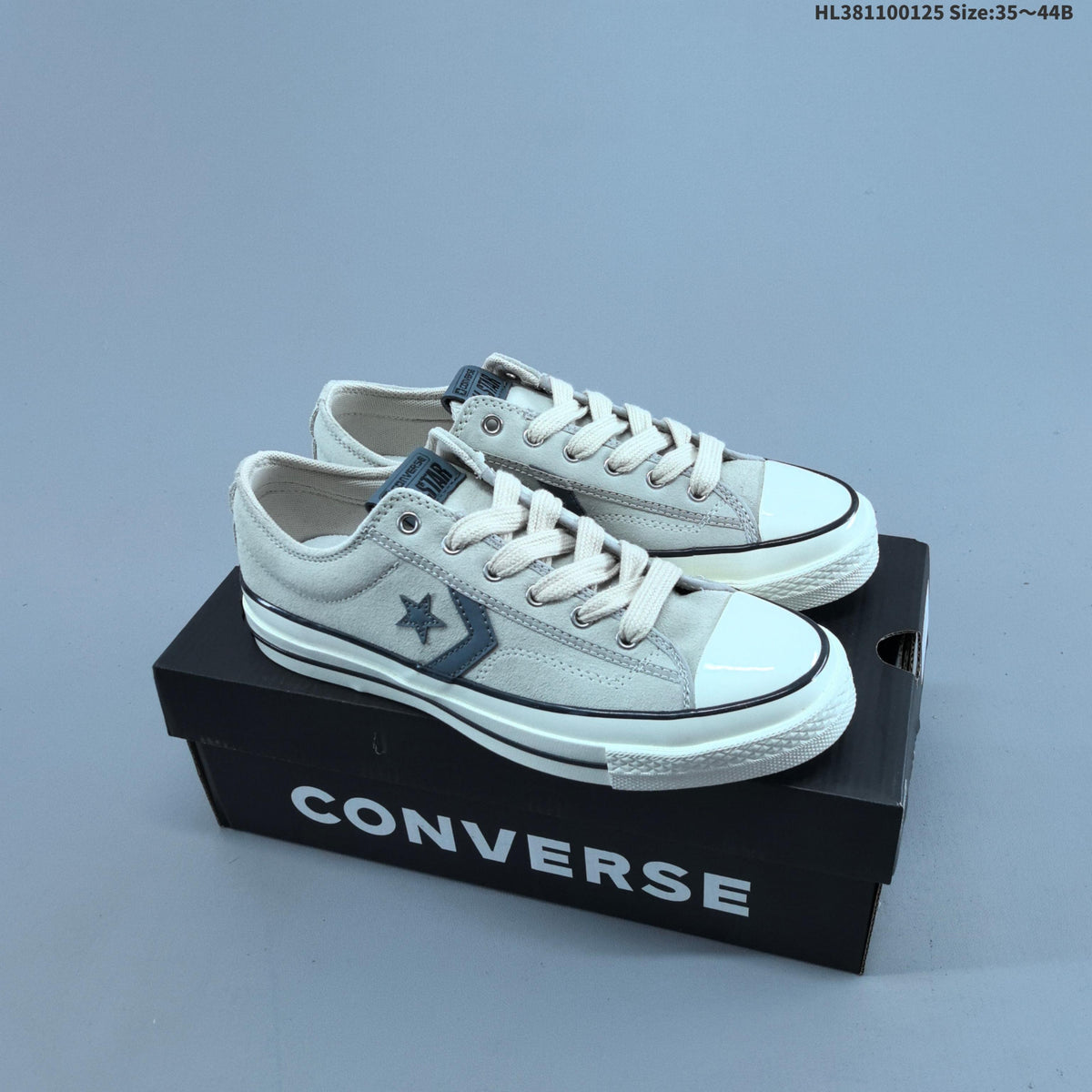 Converse Star Player Ox Low-Top Sneakers in Navy/White