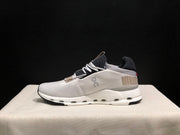 On Cloudnova 1 Sneakers in White and Sand