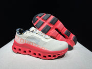 On Cloudmonster Sneakers in Light Gray and Coral