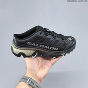 Salomon XT-4 Mule Sneakers in Black and Silver