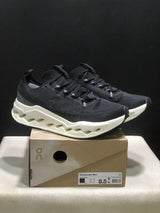 On Cloudsurfer Max Black and White Running Sneakers