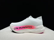 On Cloudboom Strike LS Running Shoes in Pink and White