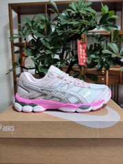 ASICS GEL-Cumulus 16 Sneakers in Peach Pink