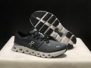 On Cloud X 4 Sneakers in Black and Dark Grey