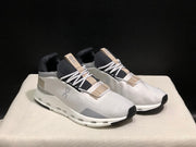 On Cloudnova 1 Sneakers in White and Sand