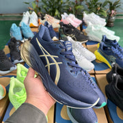 ASICS NOVABLAST 4 Running Shoes, Blue and Gold