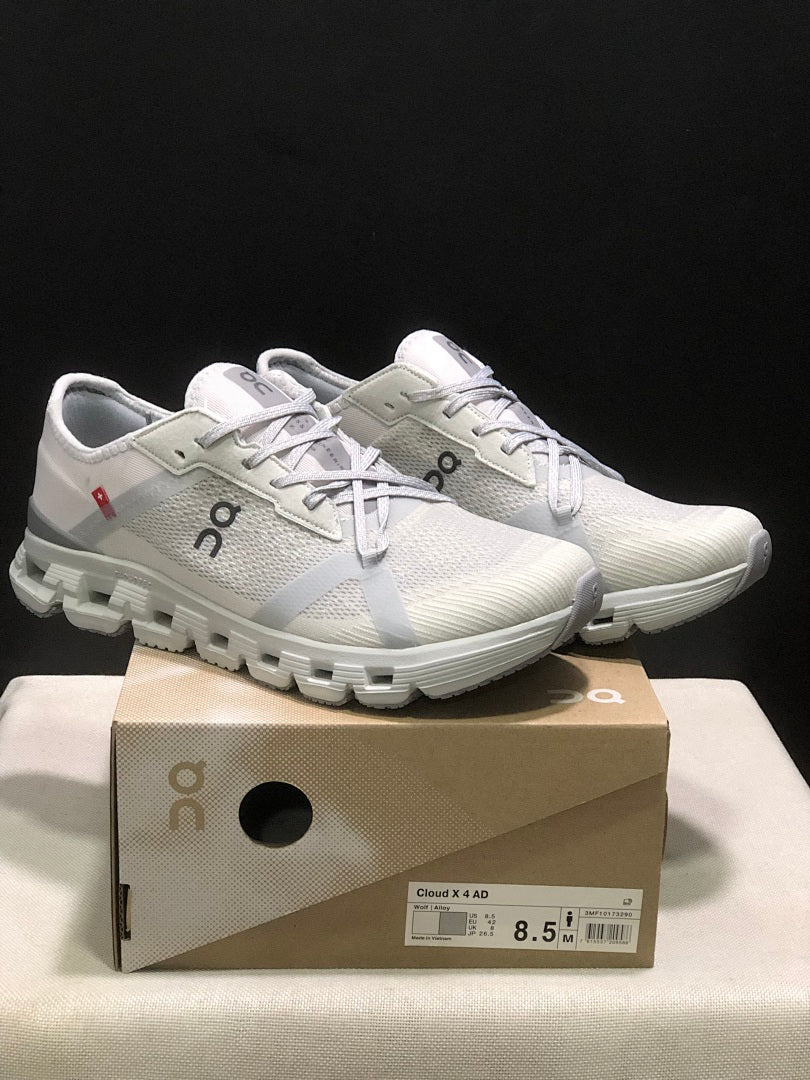 On Cloud X 4 AD Sneakers in Wolf/Alloy Light Gray