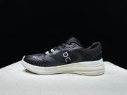 On THE ROGER Clubhouse Pro Tennis Sneakers Black and White