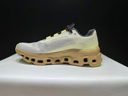 On Cloudmonster Sneakers in Sand Dune