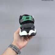 New Balance 9060 Sneakers in Charcoal and Green