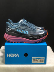 HOKA Stinson 7 Trail Running Shoes in Blue and Orange