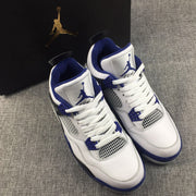 Jordan Air Jordan 4 Sneakers in White, Black and Blue