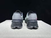 On Cloudmonster Running Shoes in Eclipse and Magnet